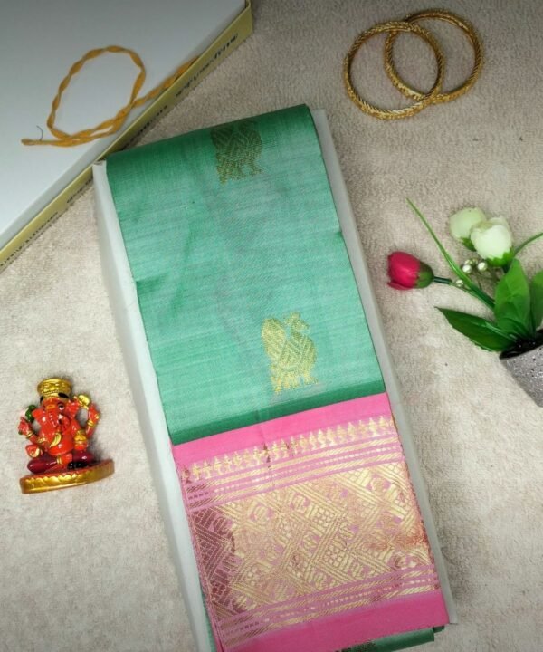 Aqua Green Handloom Silk Saree with Pink Pallu