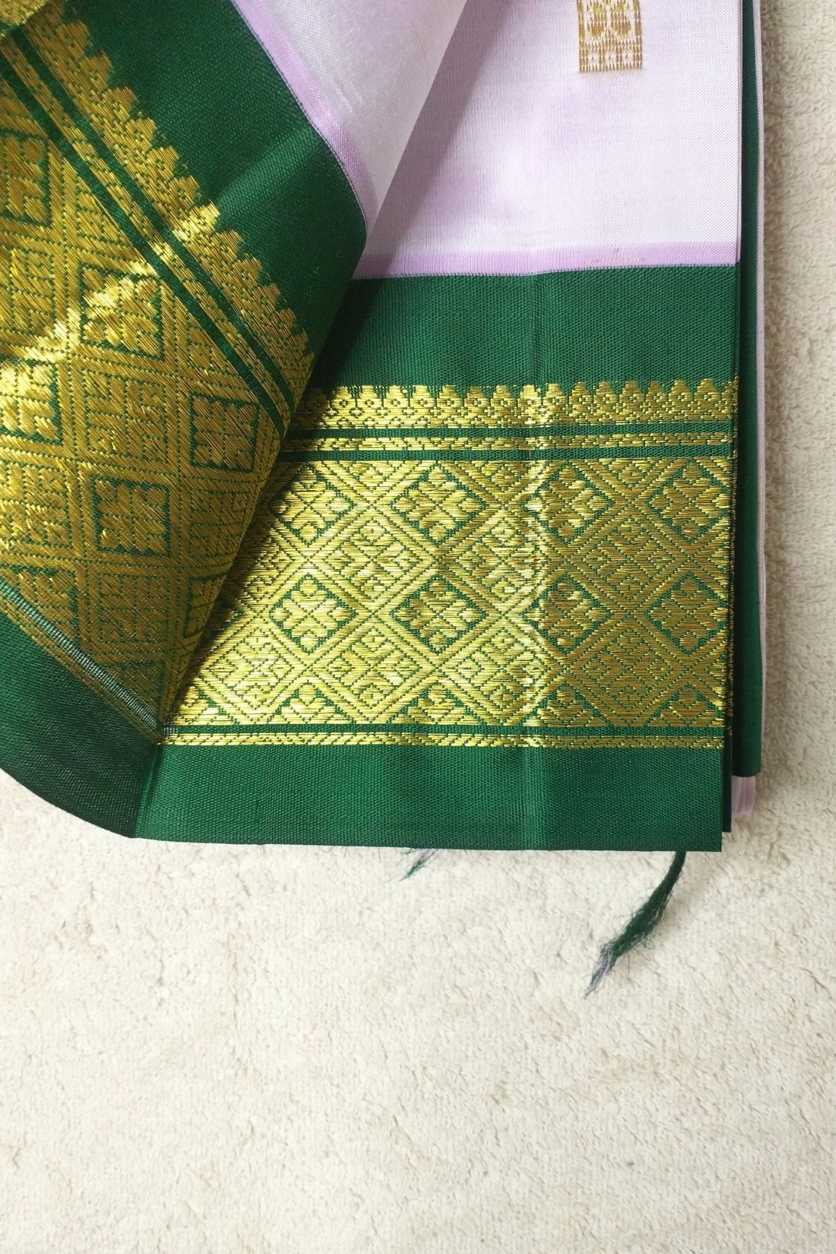Lavender Thirubuvanm silk saree with Forest Green border