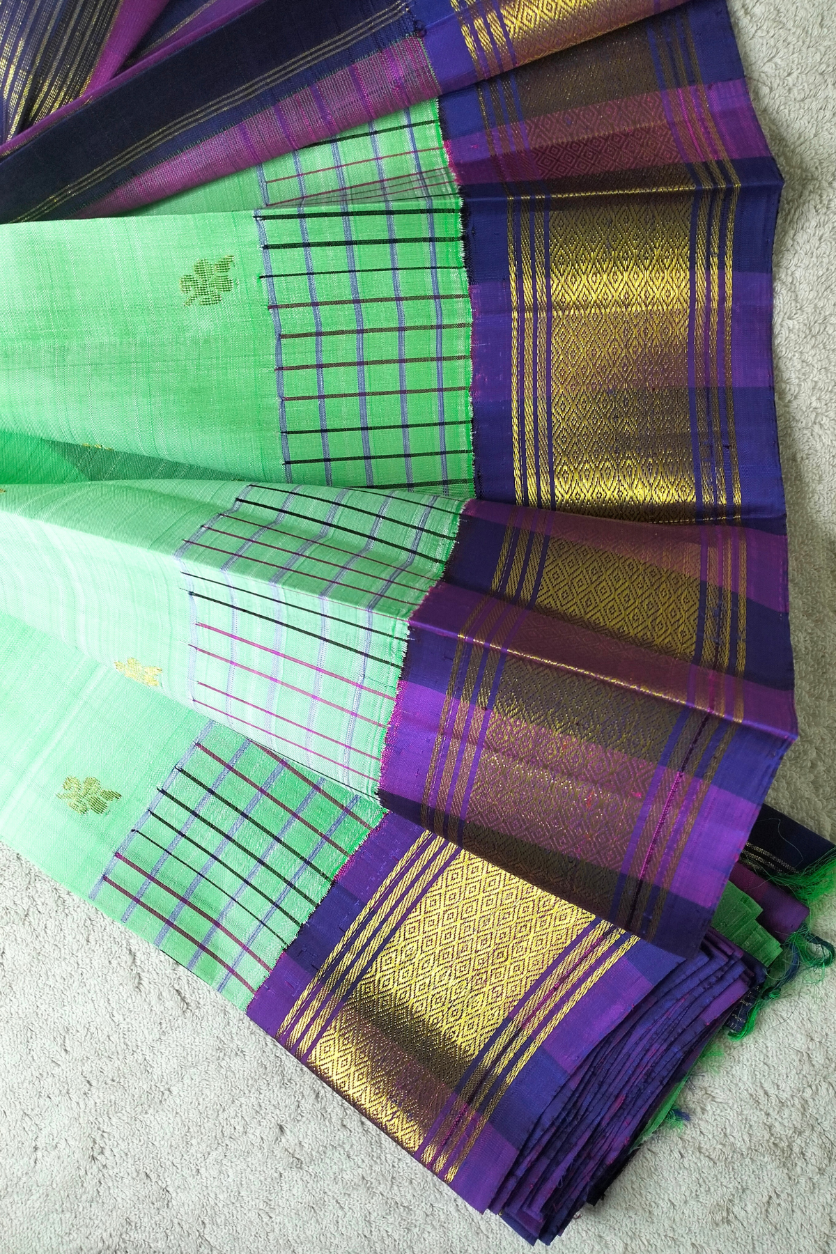 Mint green Handwooven Pure silk Saree with magenta border