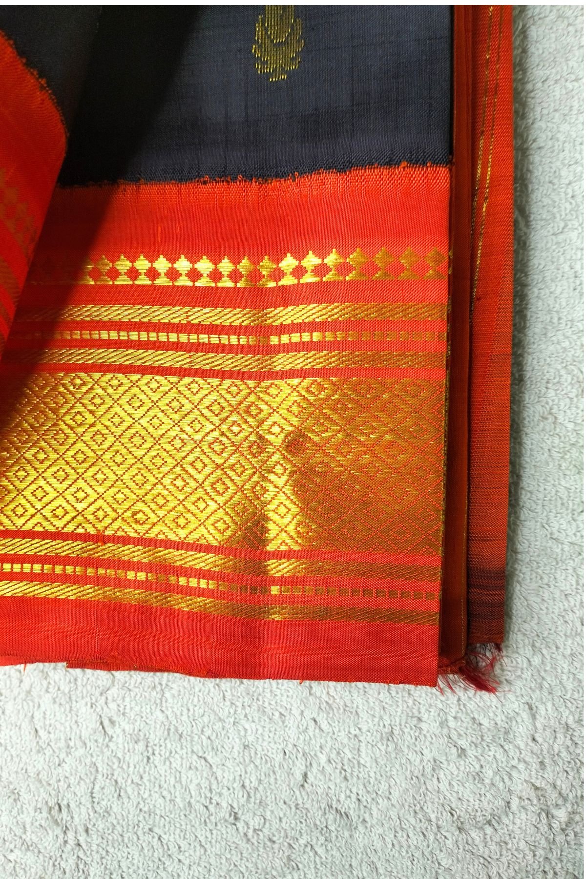Orange border thirubuvanam pattu saree