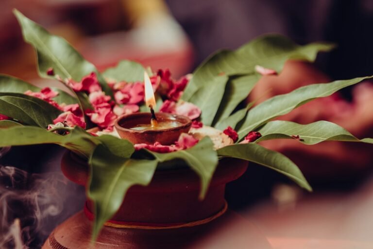Lit lamp placed on a pot for a home ceremony