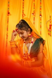 Young girl in traditional Indian dress for a coming-of-age function